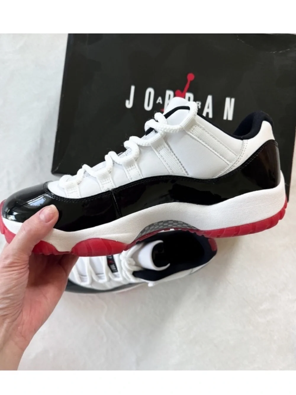 Air Jordan 11 Low Bred Black Red | Men's 8.5